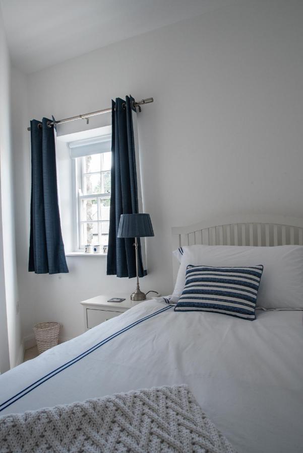 Heritage Cottages Dundrum Esterno foto